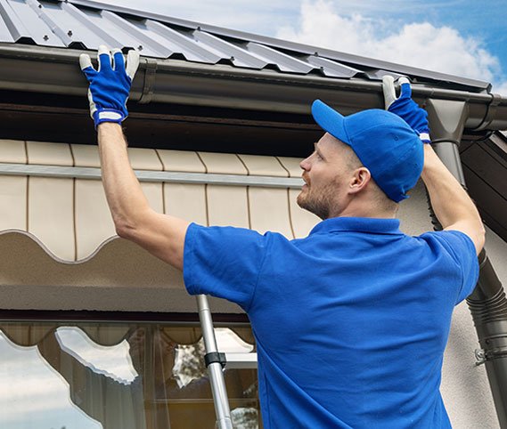 Seamless gutter installation on a home
