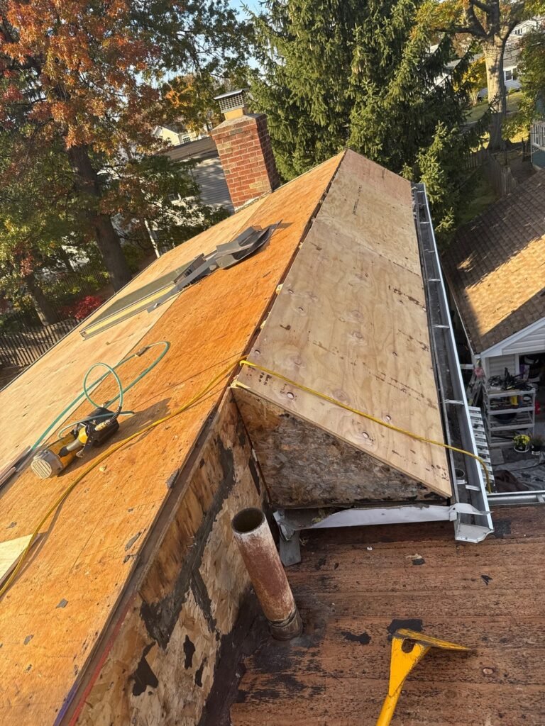 New plywood sheathing installed on the dormer during a roof replacement in Garwood NJ