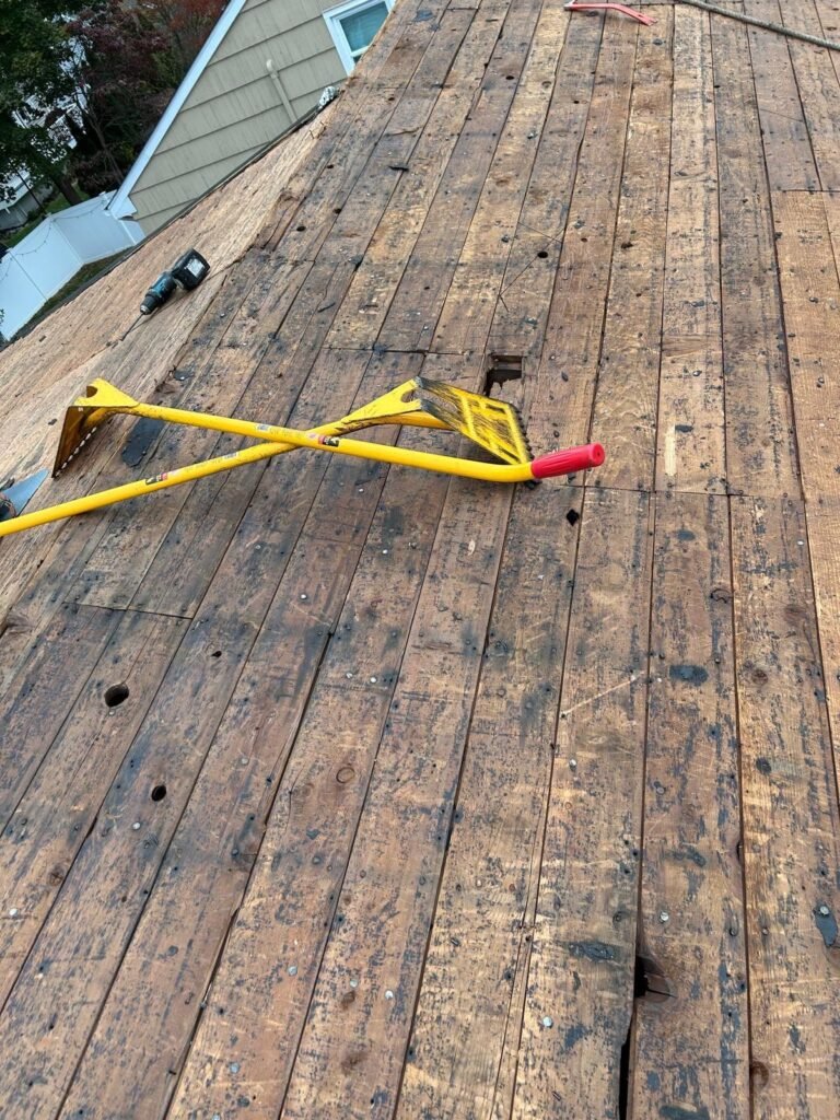 Roof stripped down to the original plank decking during a roof replacement in Garwood NJ